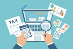 Tax payment concept.Government taxation, calculation of tax return. Man fills the tax form, documents, calendar, calculator, laptop. Pay the bills, invoices, payrolls.