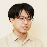實成 優馬 氏