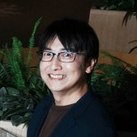 飯田 浩二 氏
